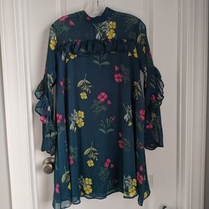 Dress with arm ruffles